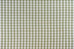 Green classic checkered tablecloth texture, background with copy space. photo