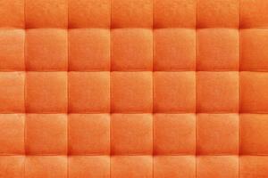 Orange suede leather background, classic checkered pattern for furniture, wall, headboard photo