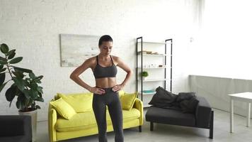 Young Woman Doing a Work Out Session At Home video