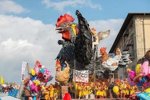 VIAREGGIO, ITALY - FEBRUARY 17, 2013 - Carnival Show parade on town street photo