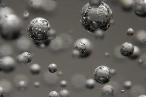 Bubbles crystal balls suspended in air photo