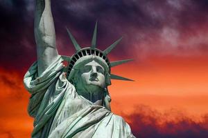 Statue of liberty in New York on dramatic post nuclear war sky background photo