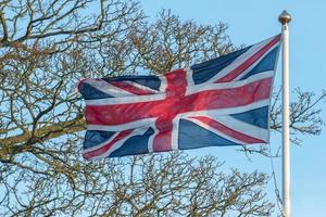 union jack reino unido bandera ondeando foto