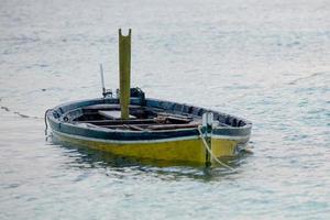 abandoned submerged woooden boat photo