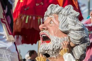 VIAREGGIO, ITALY - FEBRUARY 17, 2013 - Carnival Show parade on town street photo