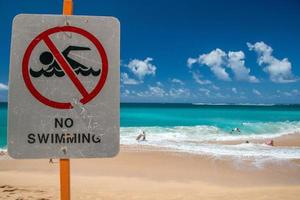 no swimming sign in Hawaii Poipu beach landscape photo