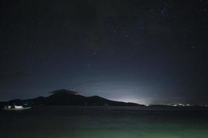 Siladen turquoise tropical paradise island night view photo