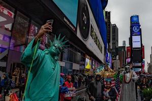 NEW YORK - USA  APRIL 22 2017 times square human statue of liberty photo