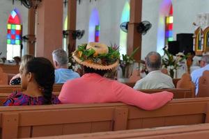 AITUTAKI, COOK ISLAND - AUGUST, 27 2017 - Local people at the mass photo