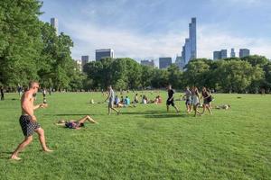 NEW YORK - USA - 14 JUNE 2015 people in central park on sunny sunday photo