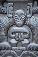 polynesian stone statue photo