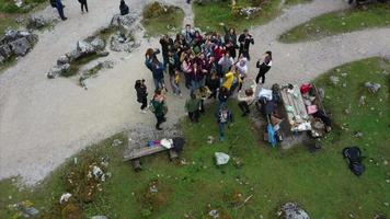 Group of people gathering for a hike video