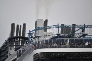 GENOA, ITALY - JULY 27 2017 - MSC MERAVIGLIA Cruise ship sailing from harbor photo