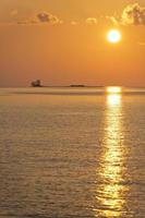 golden sunset in maldives photo