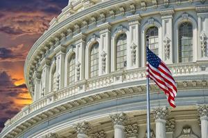 Washington DC Capitol detail on golden sunset background photo