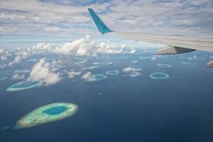 maldives aerial panorama blue water reef photo