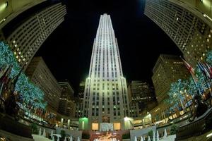 NEW YORK CITY - JUNE 13 2015 Rockfeller Center skyscraper illuminated at night photo