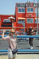 LOS ANGELES, USA - AUGUST 5, 2014 - excercise of black man in muscle beach  in venice beach photo