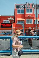 LOS ANGELES, USA - AUGUST 5, 2014 - excercise of black man in muscle beach  in venice beach photo