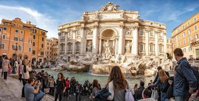 ROME, ITALY - NOVEMBER 24, 2012 - Rome Fountain di trevi crowded of tourists photo