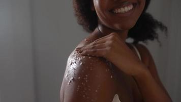 Beautiful black woman shows her skincare routine video