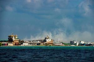 maldives rubbish island garbage in flames photo