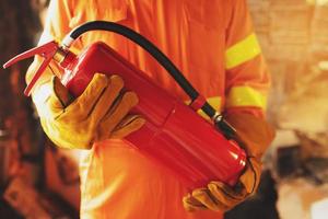 Fire extinguishers in the factory building for safety photo
