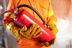 Fire extinguishers in the factory building for safety photo