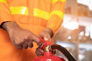 Fire extinguishers in the factory building for safety photo