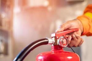 Fire extinguishers in the factory building for safety photo