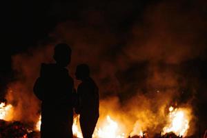 the person who runs in the fire. protester to escape from danger photo