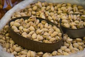 Pile of pistachios in shell in mexico photo