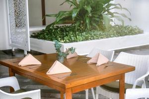 Buffet table with napkins and cutlery photo