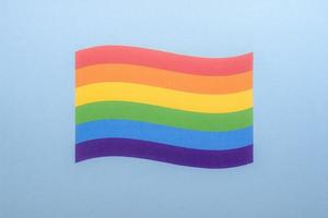 lgbt gay flag with blue background photo