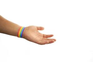 Hand with bracelet with gay lgbt colors photo