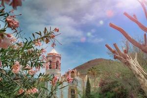 Rustic Mexican church between mountains in Guanajuato photo