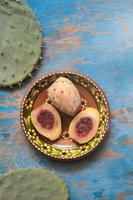 Mexican xoconostles texture with blue background photo