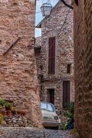 vintage old car in spello village Italy photo