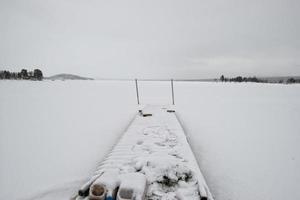 lapland frozen lake in winter photo