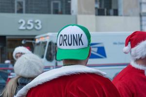 NEW YORK, USA - DECEMBER 10, 2011 - People deressed as santa claus celebrating xmas photo