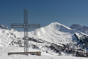 iron cross on high mountain photo