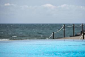 pool in tropical beach photo