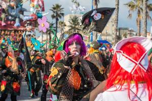 VIAREGGIO, ITALY - FEBRUARY 17, 2013 - Carnival Show parade on town street photo