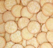 stack of round cracker biscuits background photo