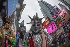 NEW YORK - USA  APRIL 22 2017 times square human statue of liberty photo