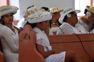 AITUTAKI, COOK ISLAND - AUGUST, 27 2017 - Local people at the mass photo