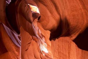 Antelope Canyon illuminated at noon photo