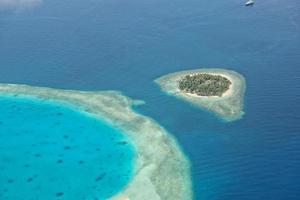 maldives aerial panorama blue water reef photo