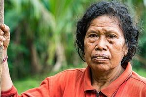 UBUD, INDONESIA - AUGUST 18, 2016 - Local Bali island people poor but happy photo