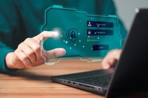 Man login with fingerprint scanning technology in the computer. Secure encryption and access to the user's private information to access the Internet. photo